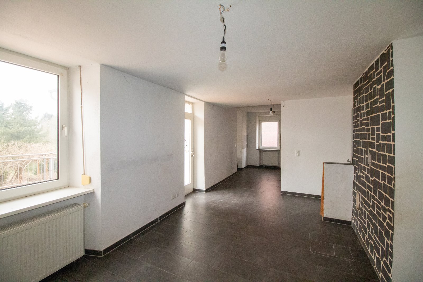 Ein- oder Mehrfamilienhaus mit potenziellem Bauland!