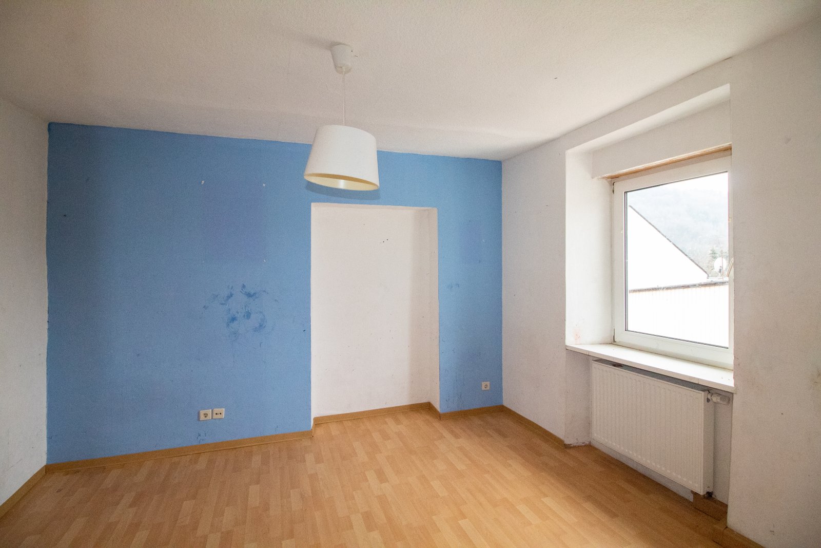 Ein- oder Mehrfamilienhaus mit potenziellem Bauland!