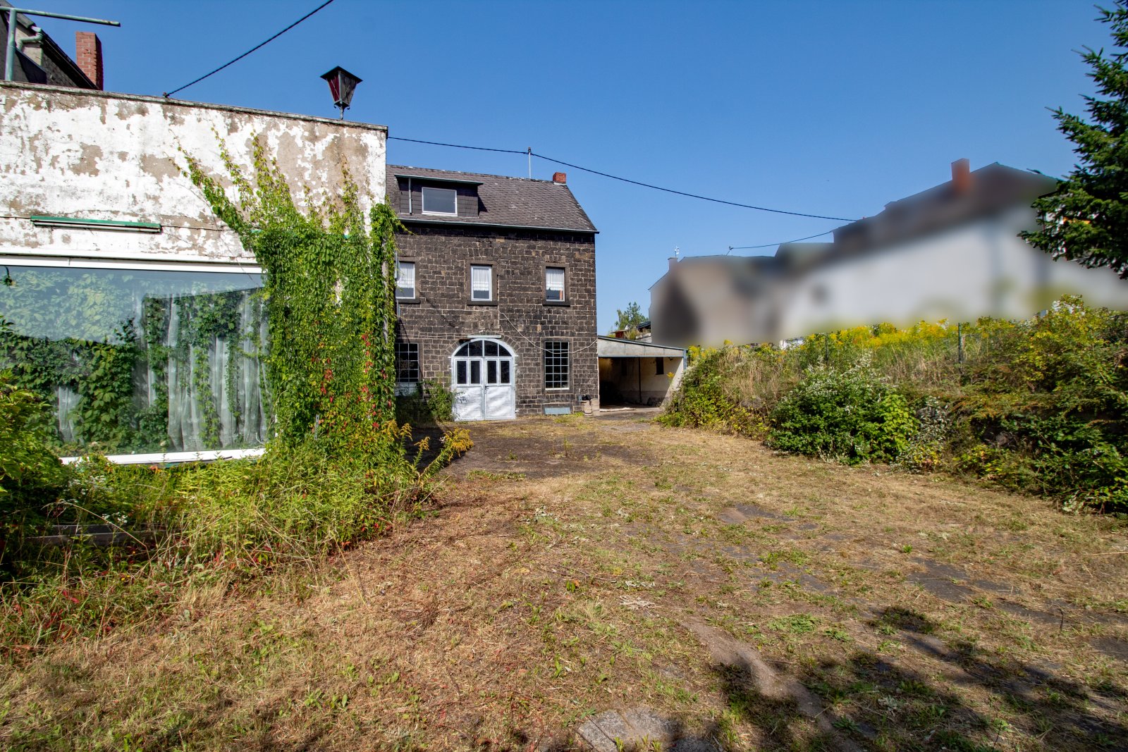 Raum für Visionen: Ein Haus voller Möglichkeiten in zentraler Lage mit zusätzlichem Baugrundstück!