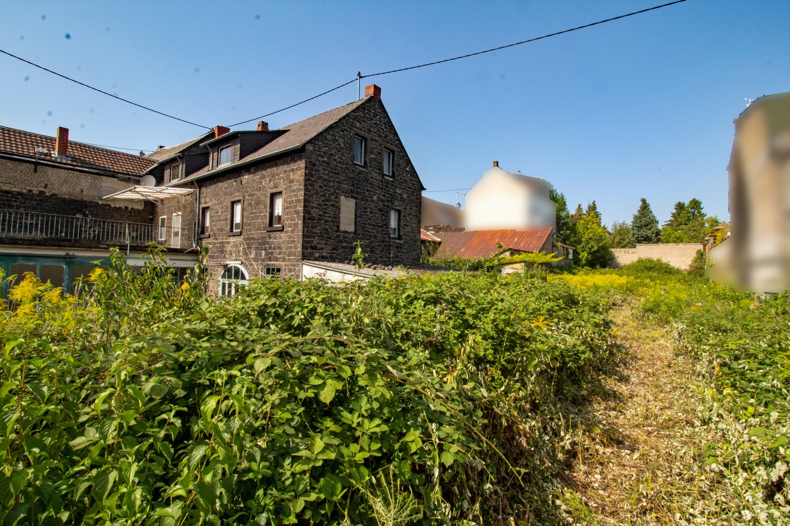 Raum für Visionen: Ein Haus voller Möglichkeiten in zentraler Lage mit zusätzlichem Baugrundstück!