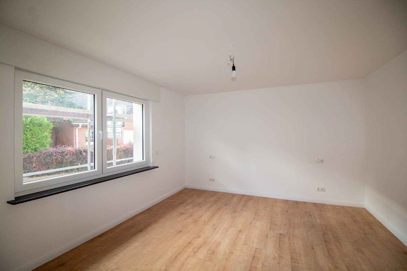 Moderne Erdgeschosswohnung im Herzen von Kettig – Erstbezug mit Balkon und Garage!