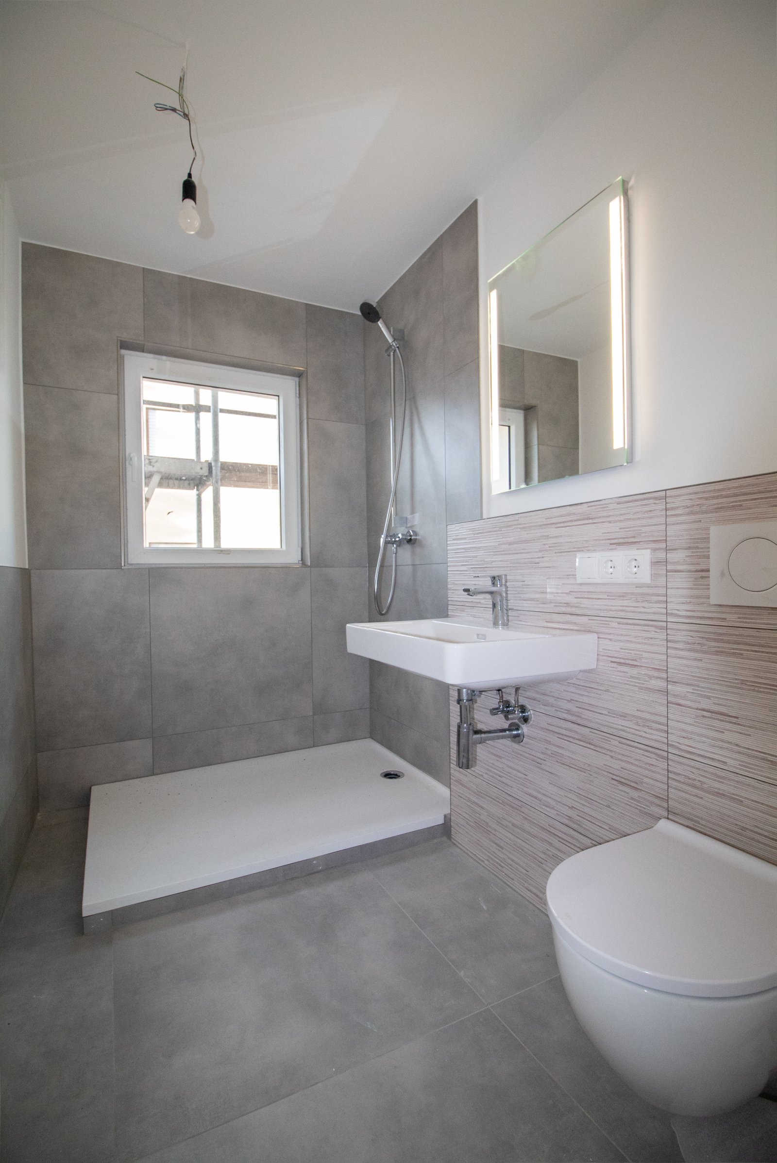 Moderne Erdgeschosswohnung im Herzen von Kettig – Erstbezug mit Balkon und Garage!